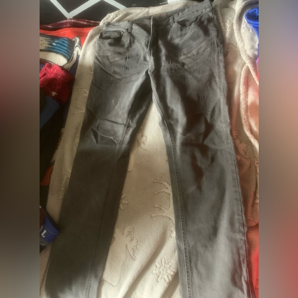 Woman’s gray jeans